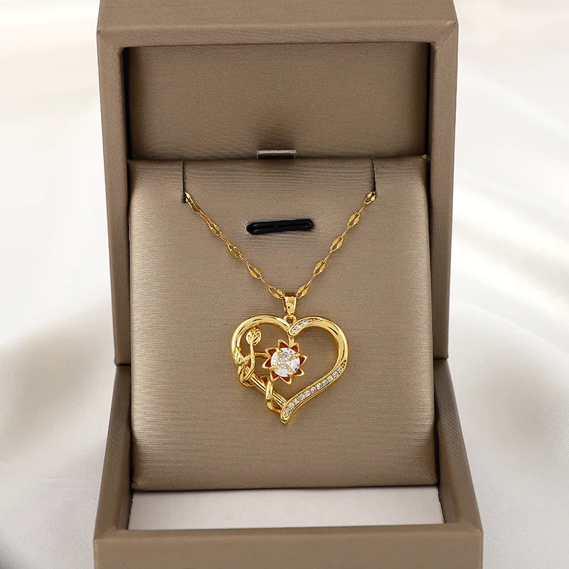 Entspannende 360° drehbare herzförmige Blume Sonnenblume Anhänger Kette