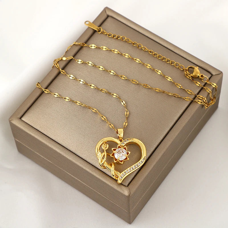 Entspannende 360° drehbare herzförmige Blume Sonnenblume Anhänger Kette