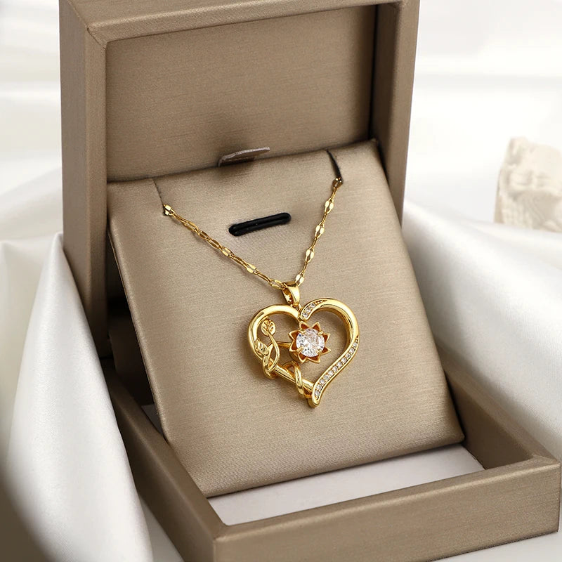 Entspannende 360° drehbare herzförmige Blume Sonnenblume Anhänger Kette