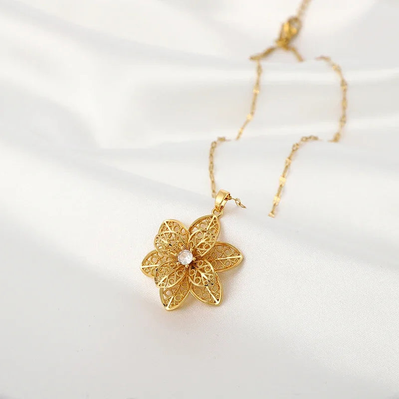 Enchanting 360° Rotatable Decompression Style Hollow Pattern Pendant Necklace