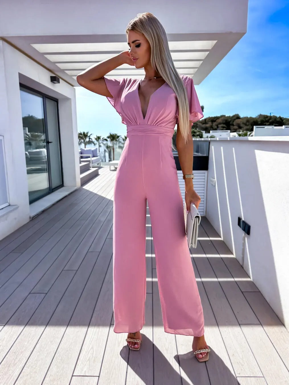 Elegance Couture Witte V-Hals Rugloze Jumpsuit