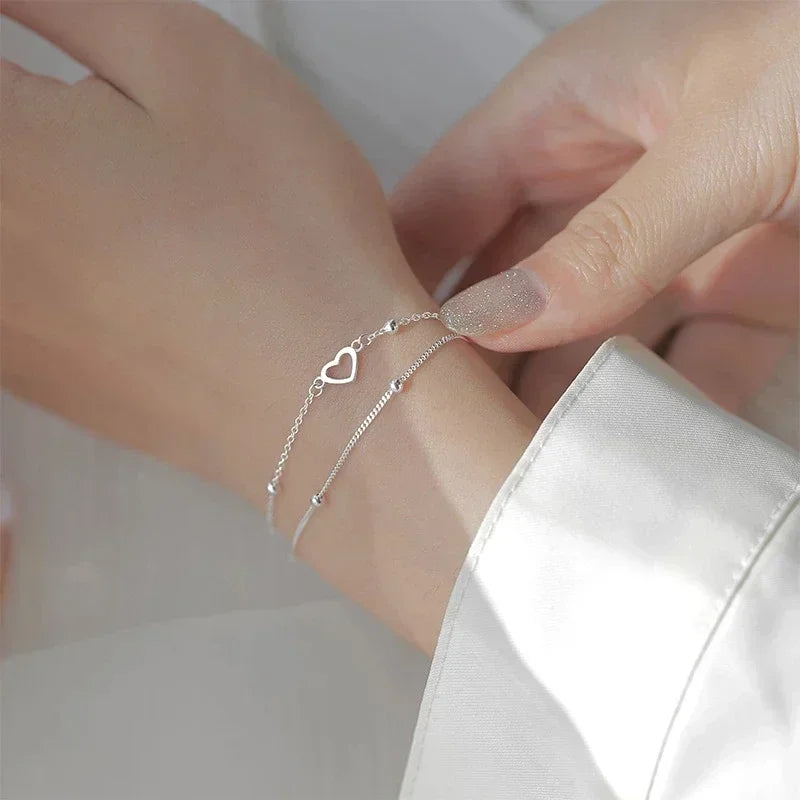 Betoverende 925 Sterling Zilveren Dubbele Liefde Hart Holle Ronde Kralen Armband