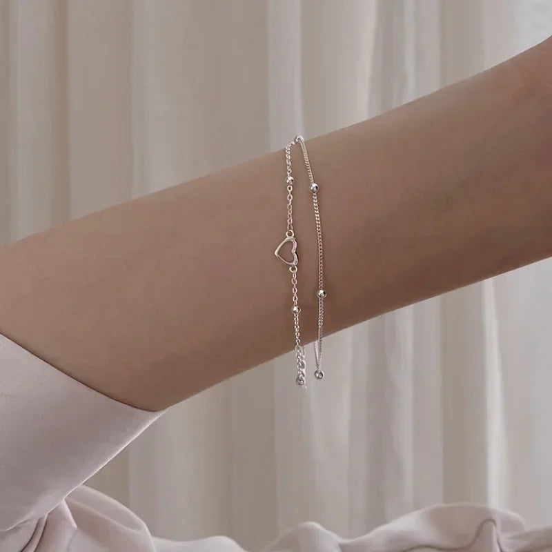 Betoverende 925 Sterling Zilveren Dubbele Liefde Hart Holle Ronde Kralen Armband