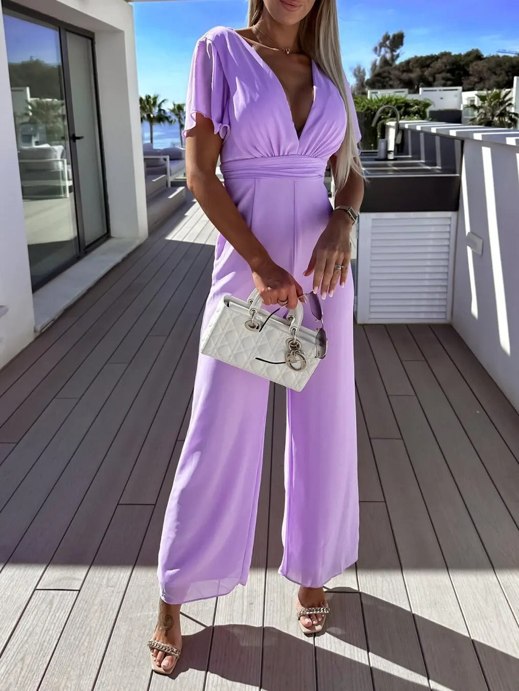 Elegance Couture Witte V-Hals Rugloze Jumpsuit