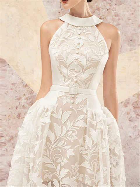 Aurora Sommerkleid mit offenem Rücken und Stickerei