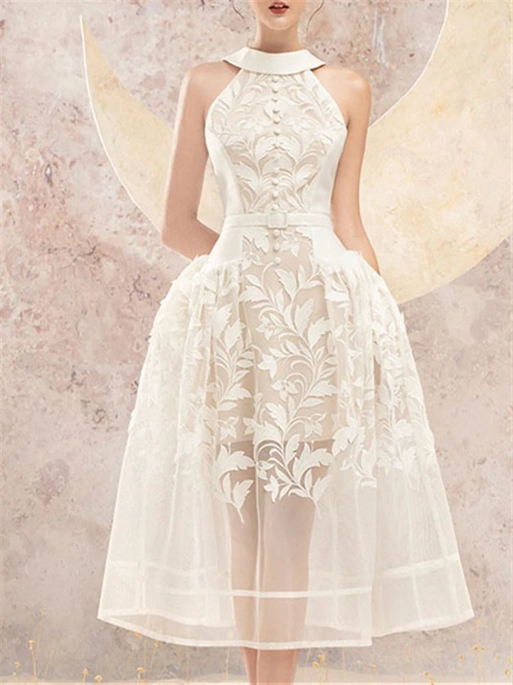 Aurora Sommerkleid mit offenem Rücken und Stickerei