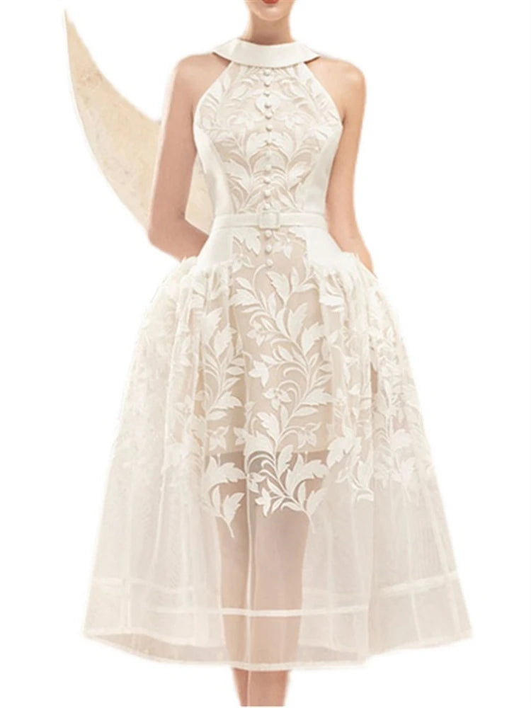 Aurora Sommerkleid mit offenem Rücken und Stickerei