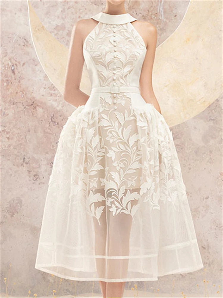 Aurora Sommerkleid mit offenem Rücken und Stickerei