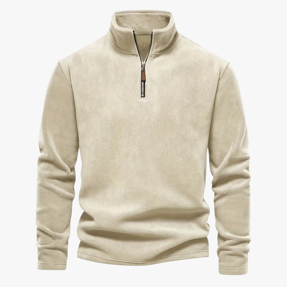 Stijlvolle en casual Bastian trui in beige kleur, voorzien van een halve ritssluiting en opstaande kraag. Perfect voor een comfortabele en veelzijdige look.