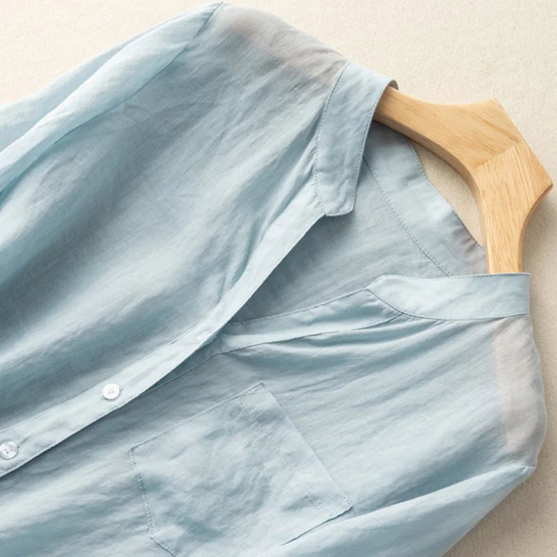 Elegante camicetta da donna in cotone leggera con scollo a V