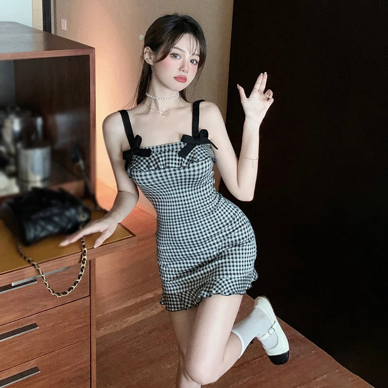 ModeWhisperer Plaid Halter Dress - Confident Elegance for Every Occasion!