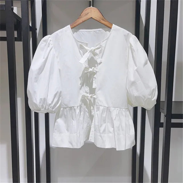 ZomerGlow Damenbluse mit Print und Schleife