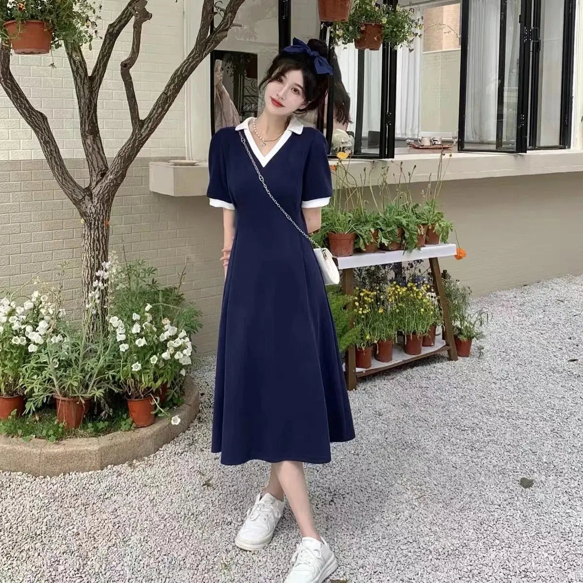 Charming French summer dress with V-neck and A-line silhouette