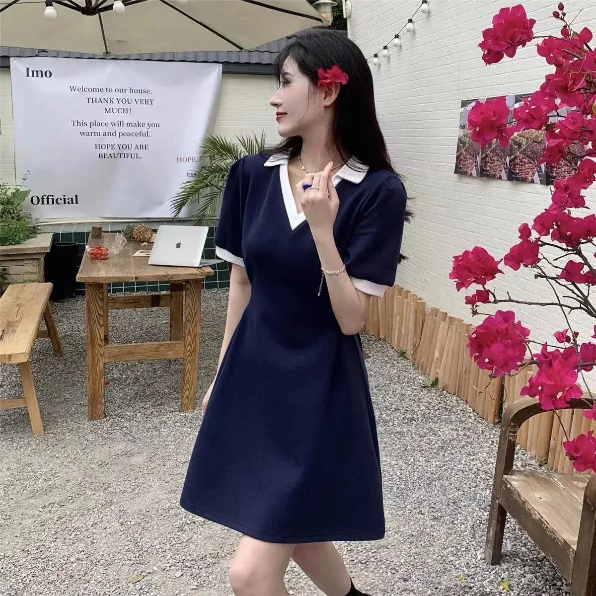 Charming French summer dress with V-neck and A-line silhouette