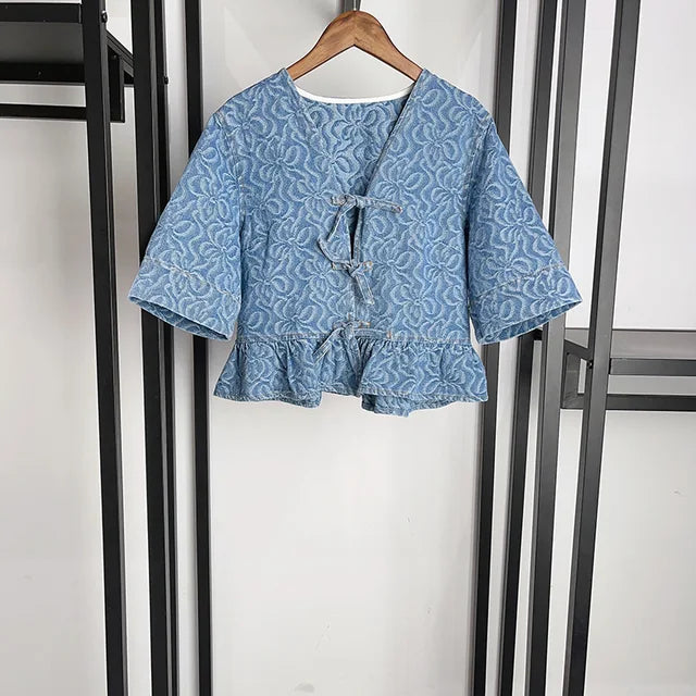 Blusa de mezclilla retro con patrón geométrico