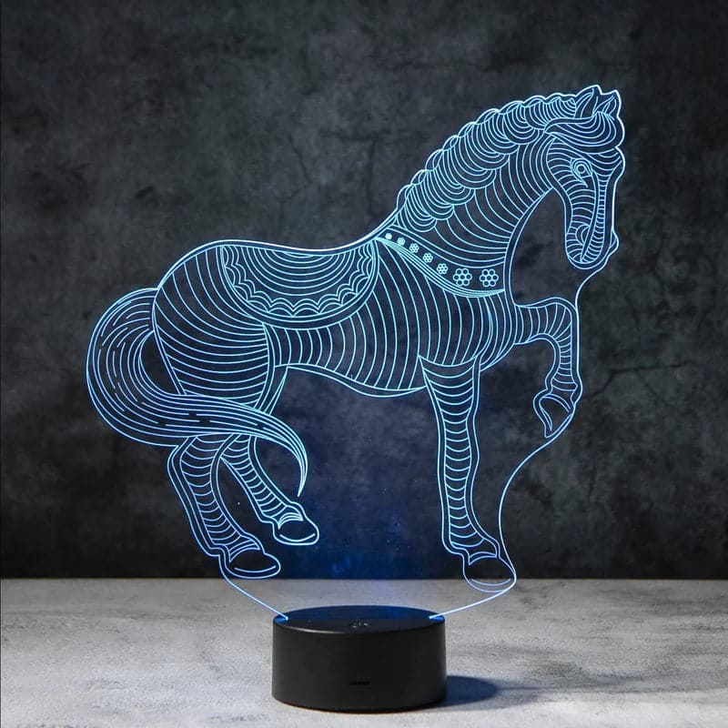 Een elegante 3D-nachtlamp in de vorm van een paard, die in zacht blauw licht straalt. Deze stijlvolle lamp creëert een gezellige en rustgevende sfeer en is uitstekend geschikt als decoratie voor elke slaapkamer of woonkamer.