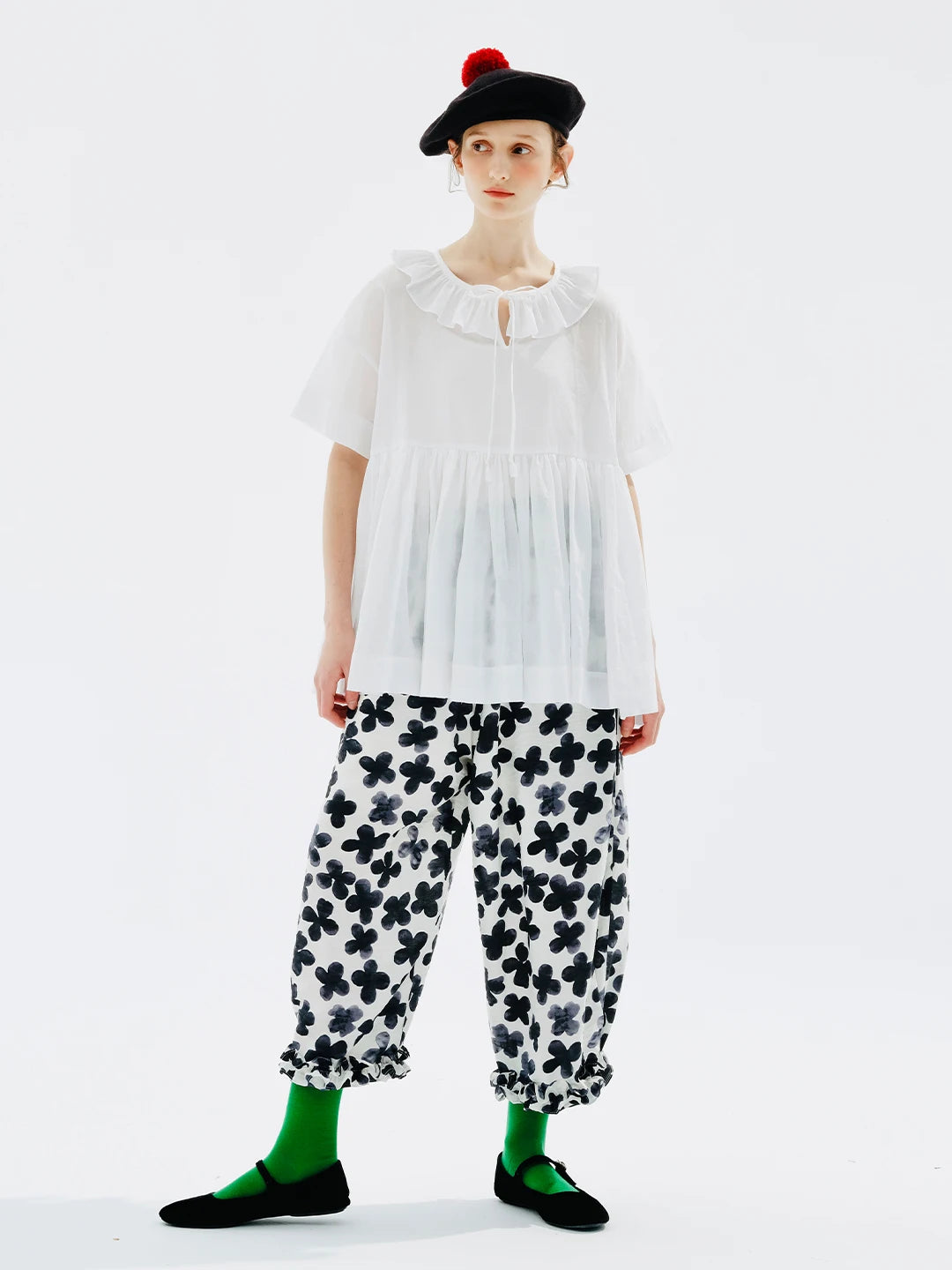 Blouse d'été élégante brillante du soleil