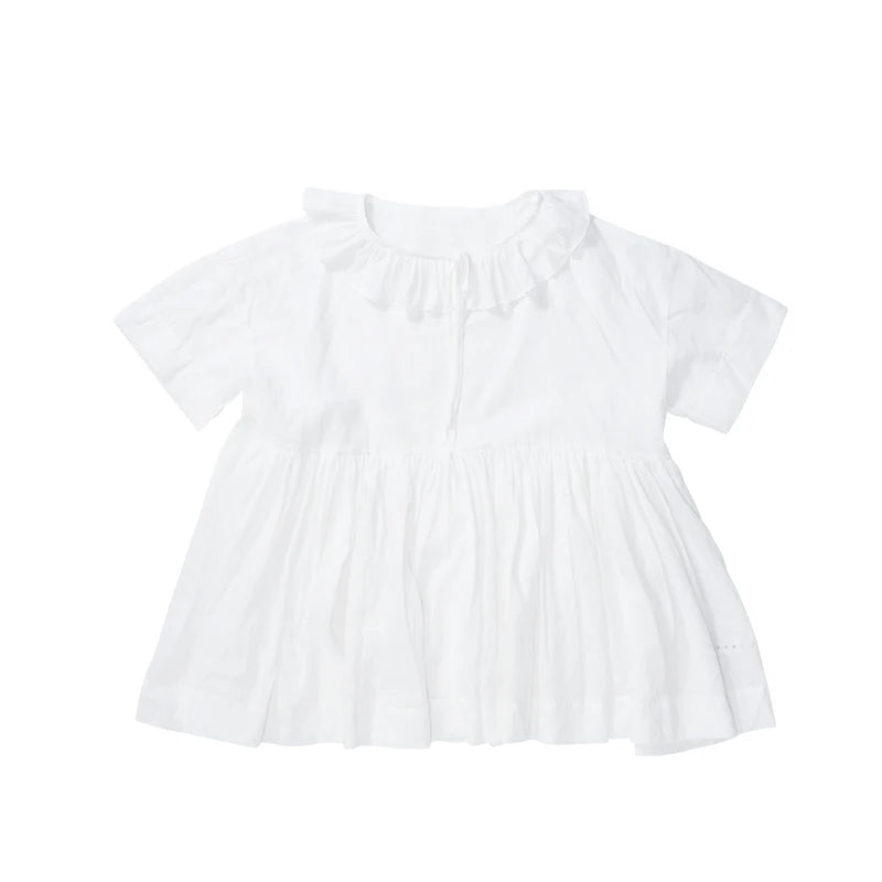 Blouse d'été élégante brillante du soleil