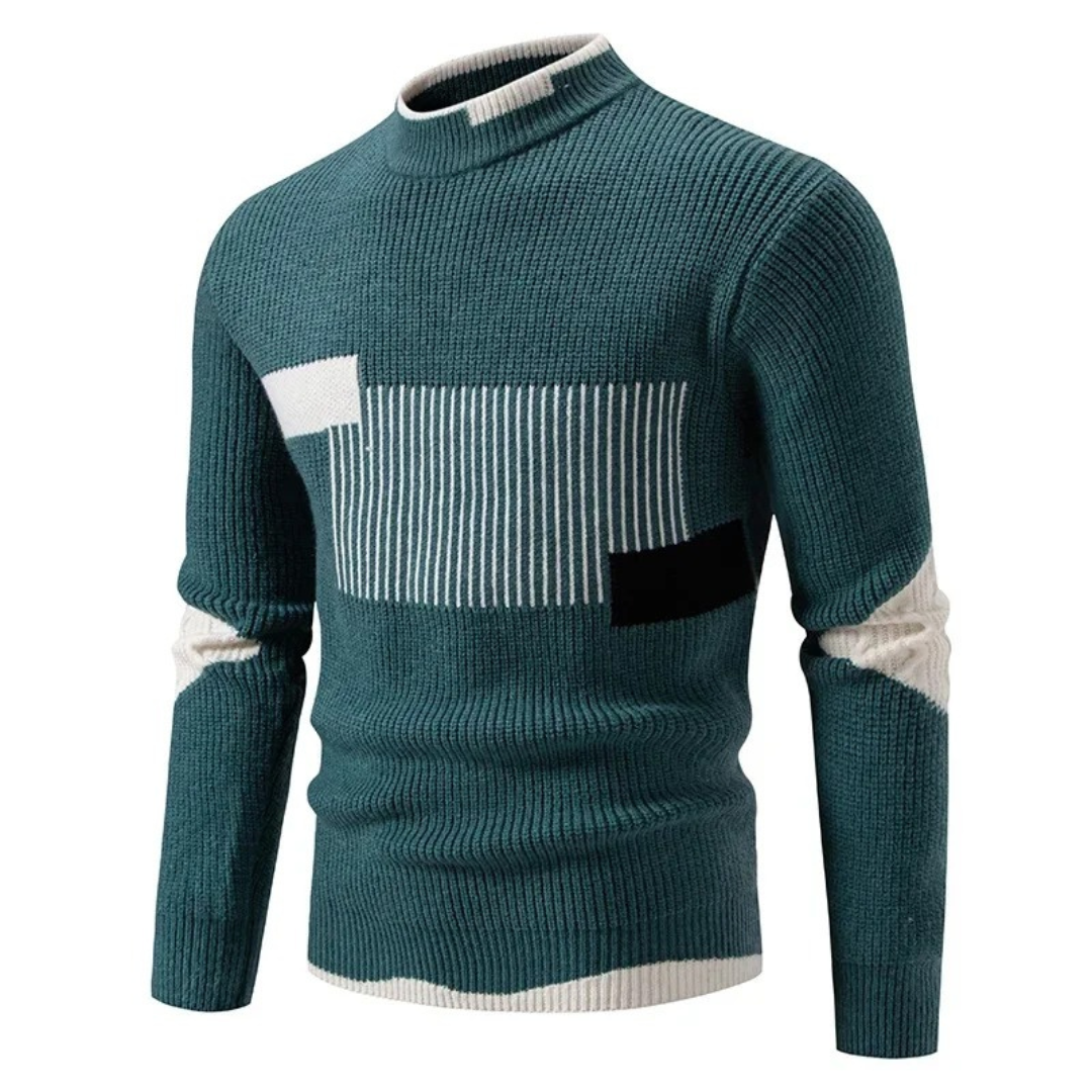 Keenex veelzijdige trui in groen met een modern geometrisch patroon, witte en zwarte accenten, en een comfortabele hoge hals.
