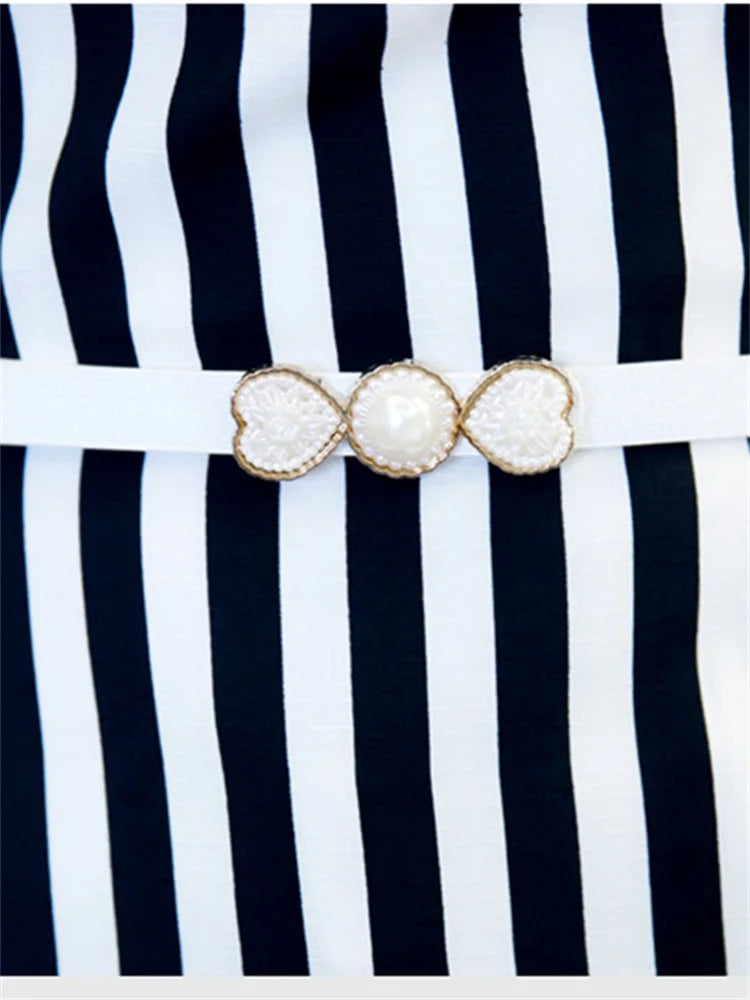 Blusa lunga in chiffon con righe e cintura