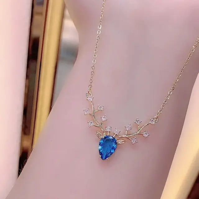 Enchanting Zircon Crystal Deer Pendant