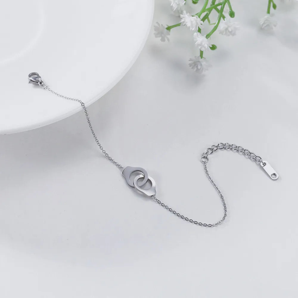 Urban Charms Stalen Armband met Handboei-hanger