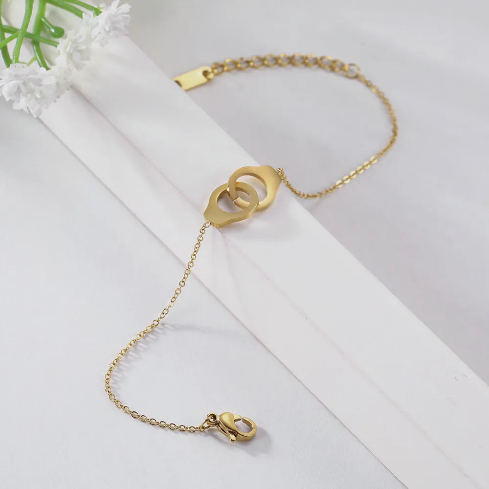 Urban Charms Stalen Armband met Handboei-hanger