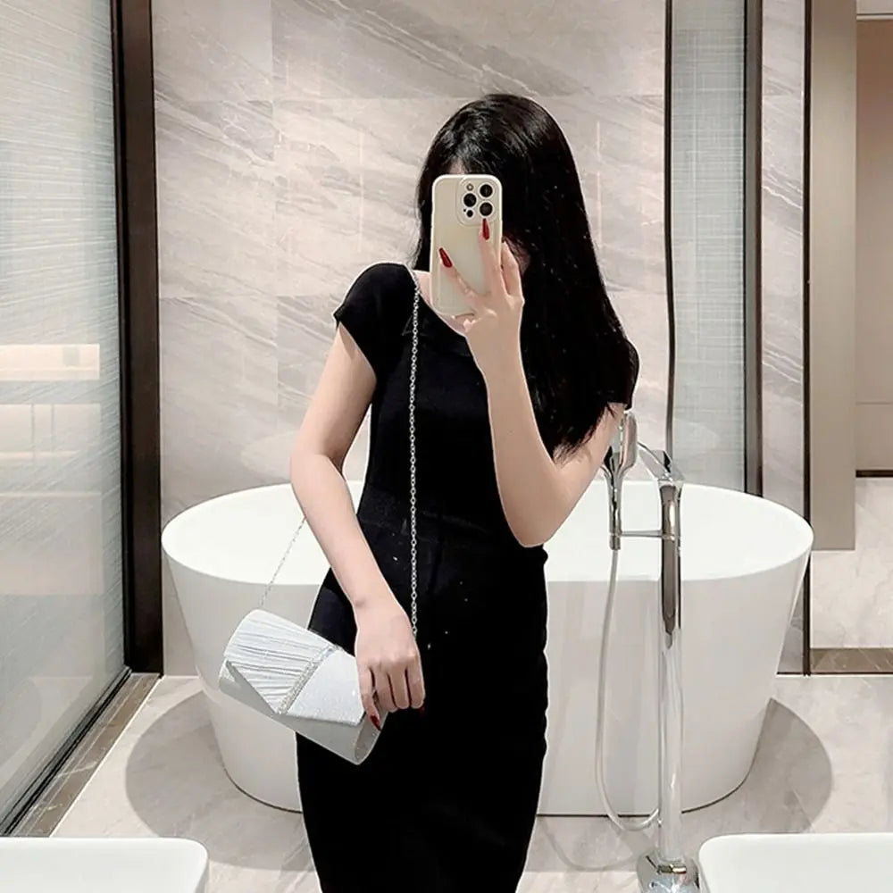 Lumière Luxe Glitzernde Clutch