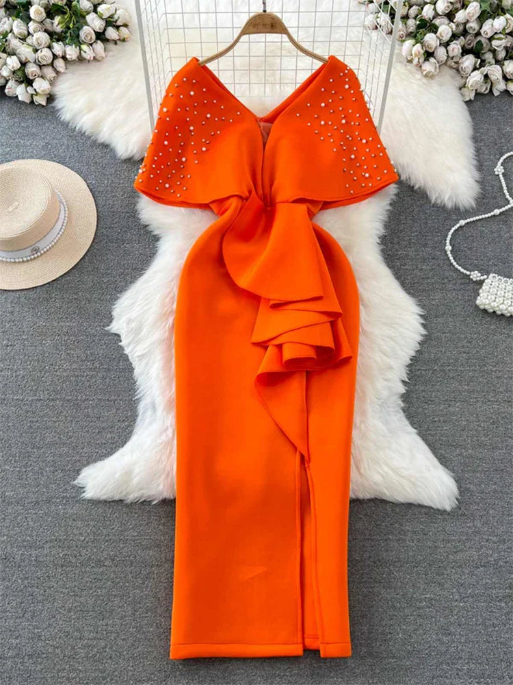Amara | Mouwloze vintage A-lijn avondjurk voor dames | Oranje