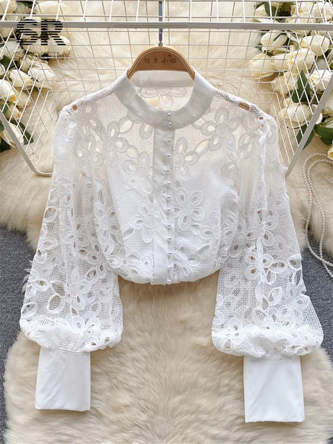 Blusa de primavera suelta y elegante con mangas farol huecas