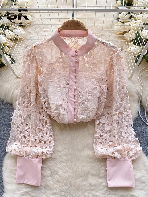 Blusa de primavera suelta y elegante con mangas farol huecas