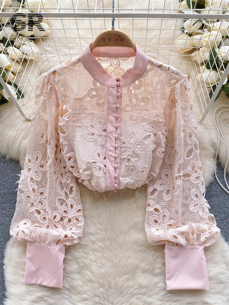 Blusa de primavera suelta y elegante con mangas farol huecas