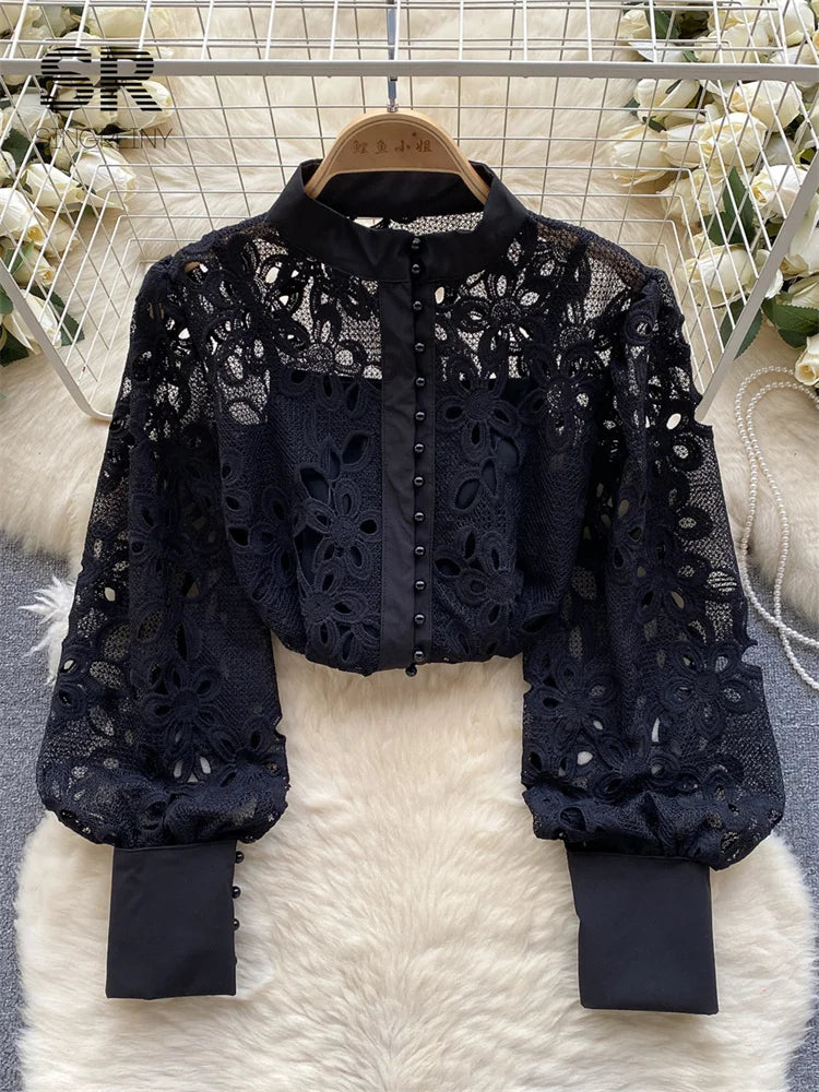 Blusa de primavera suelta y elegante con mangas farol huecas