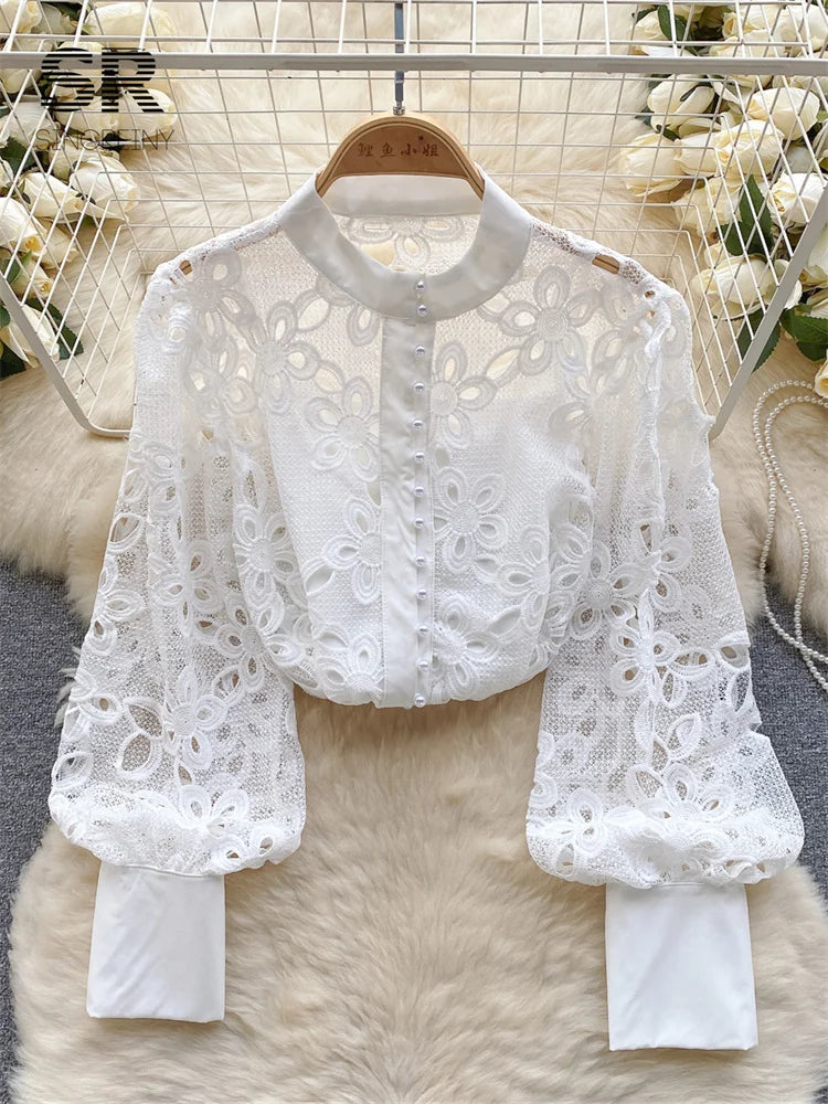 Blusa de primavera suelta y elegante con mangas farol huecas