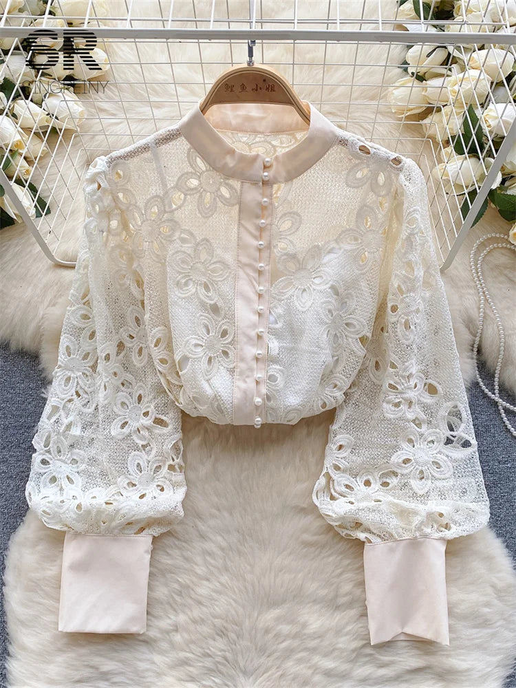 Blusa de primavera suelta y elegante con mangas farol huecas