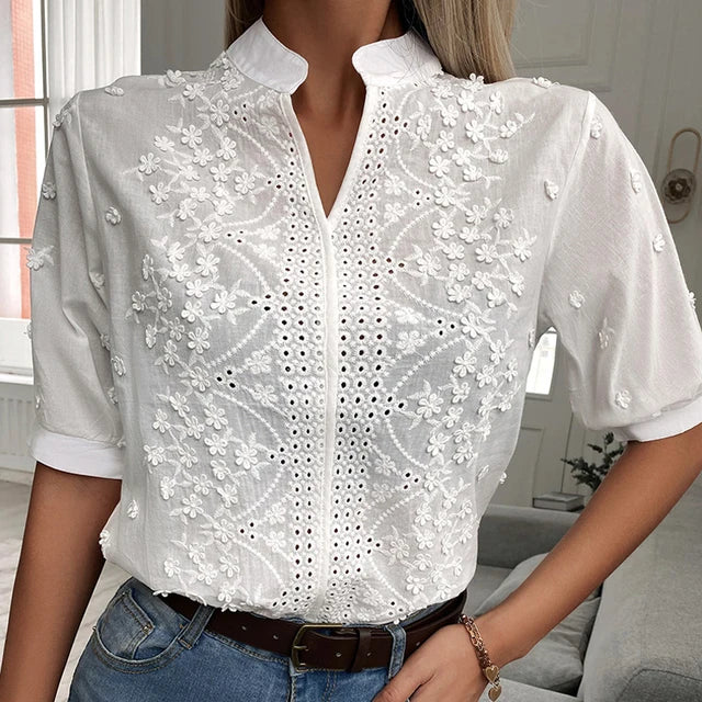 Blusa de encaje bordado con flores de verano