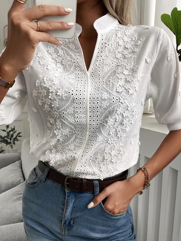 Blusa de encaje bordado con flores de verano