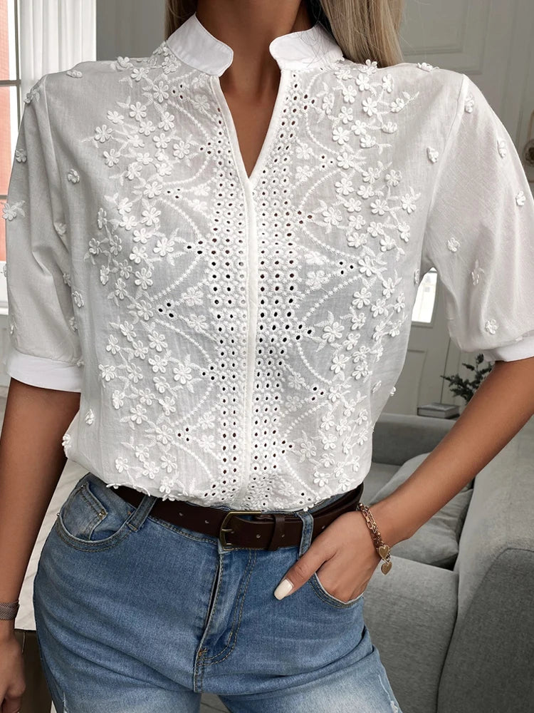 Blusa de encaje bordado con flores de verano