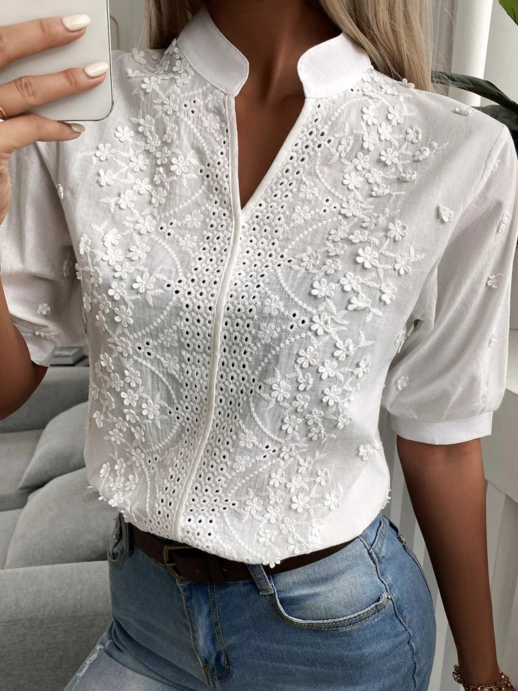 Blusa de encaje bordado con flores de verano