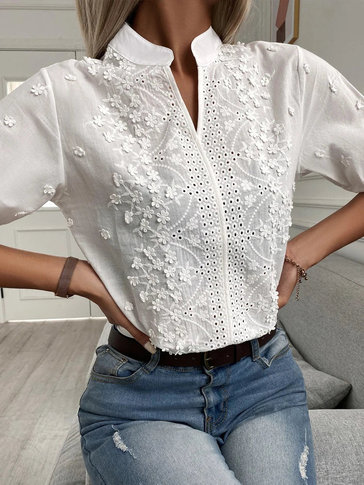 Blusa de encaje bordado con flores de verano