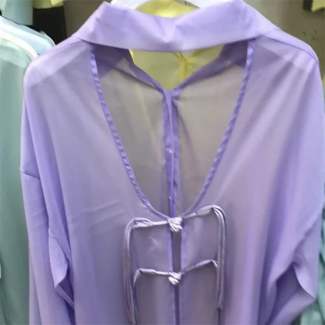 Top estivo protettivo solare azzurro cielo per donna