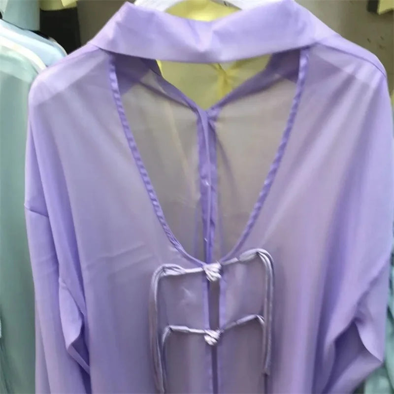 Top estivo protettivo solare azzurro cielo per donna