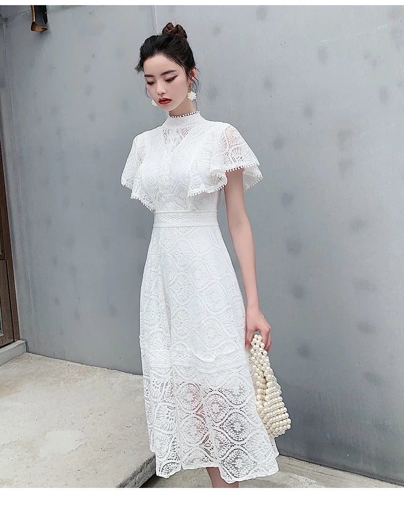 Vintage elegant party dress with ruffles from Tingfly
