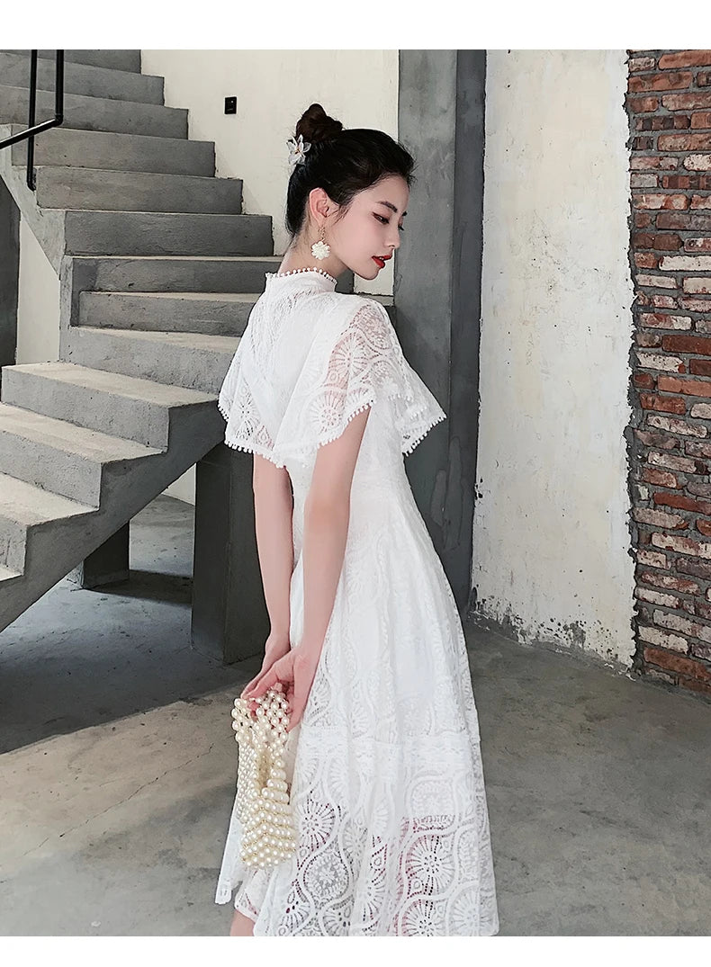 Vintage elegant party dress with ruffles from Tingfly