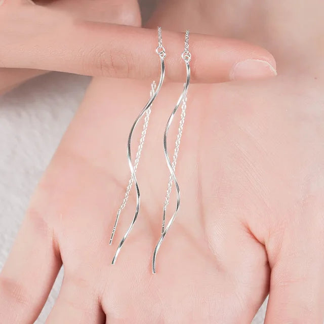 Prachtige Zilveren Golf Oorbellen voor Tijdloze Elegantie