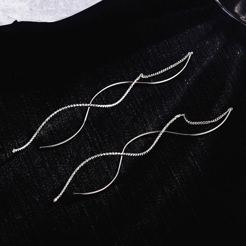 Prachtige Zilveren Golf Oorbellen voor Tijdloze Elegantie