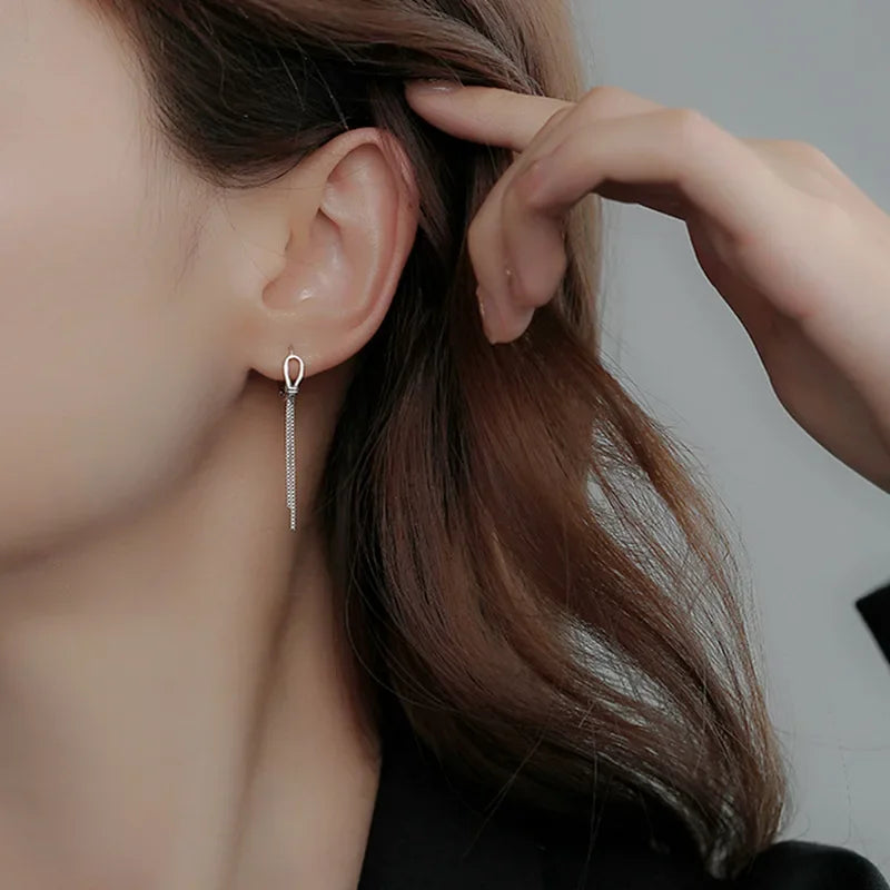 Voq Orecchini con Nappine Intrecciate Argento