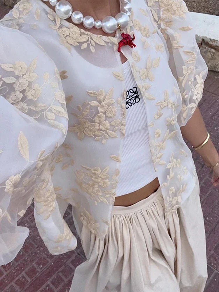 Blouse féminine transparente en dentelle et mesh