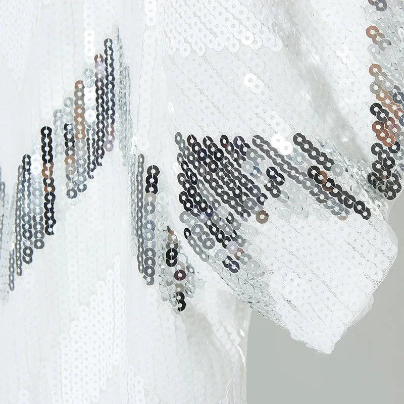 Vestito alla moda a mezza lunghezza con paillettes