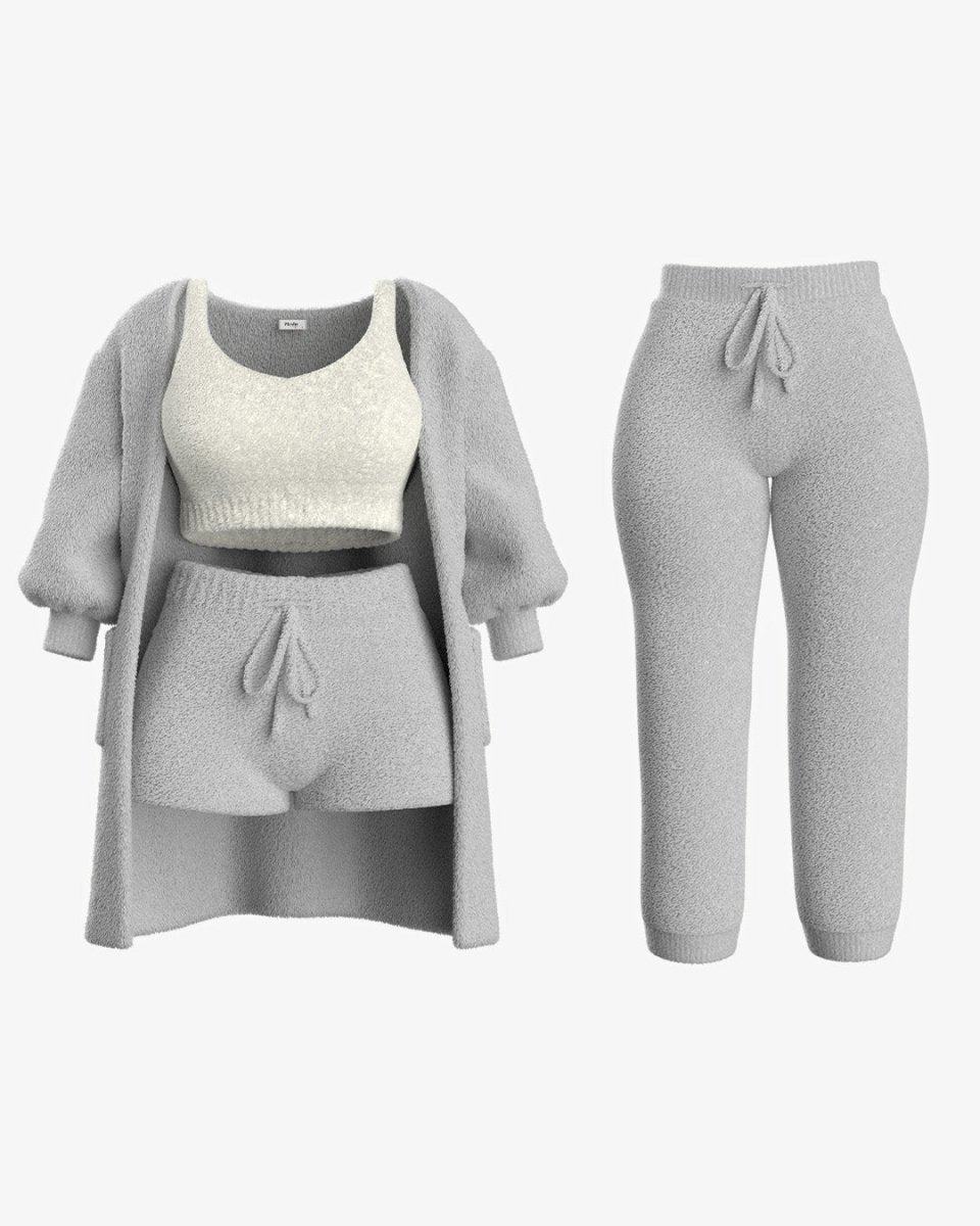 Grijs fleece set met een comfortabele top, trui en broek, perfect voor een warme en gezellige outfit.